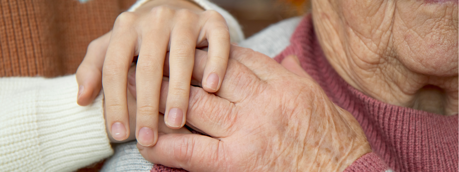 An older adult being cared for