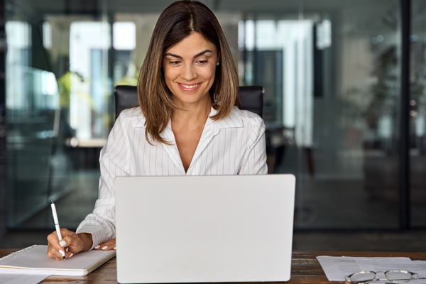 a womain on a laptop for an elearning session